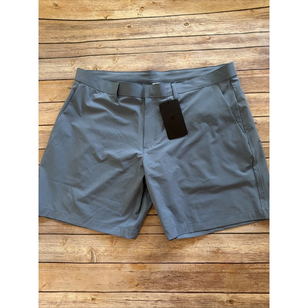 $75 Fabletics The Only Tech Short Mens 38 Performance Chino NEW NWT Blue